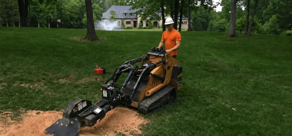 Stump grinder removing a large stump