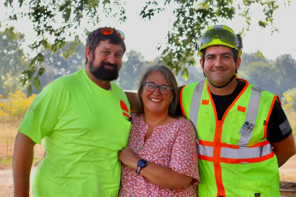 Chris Haubner, Dave, and Teri — the Tree Wizard team